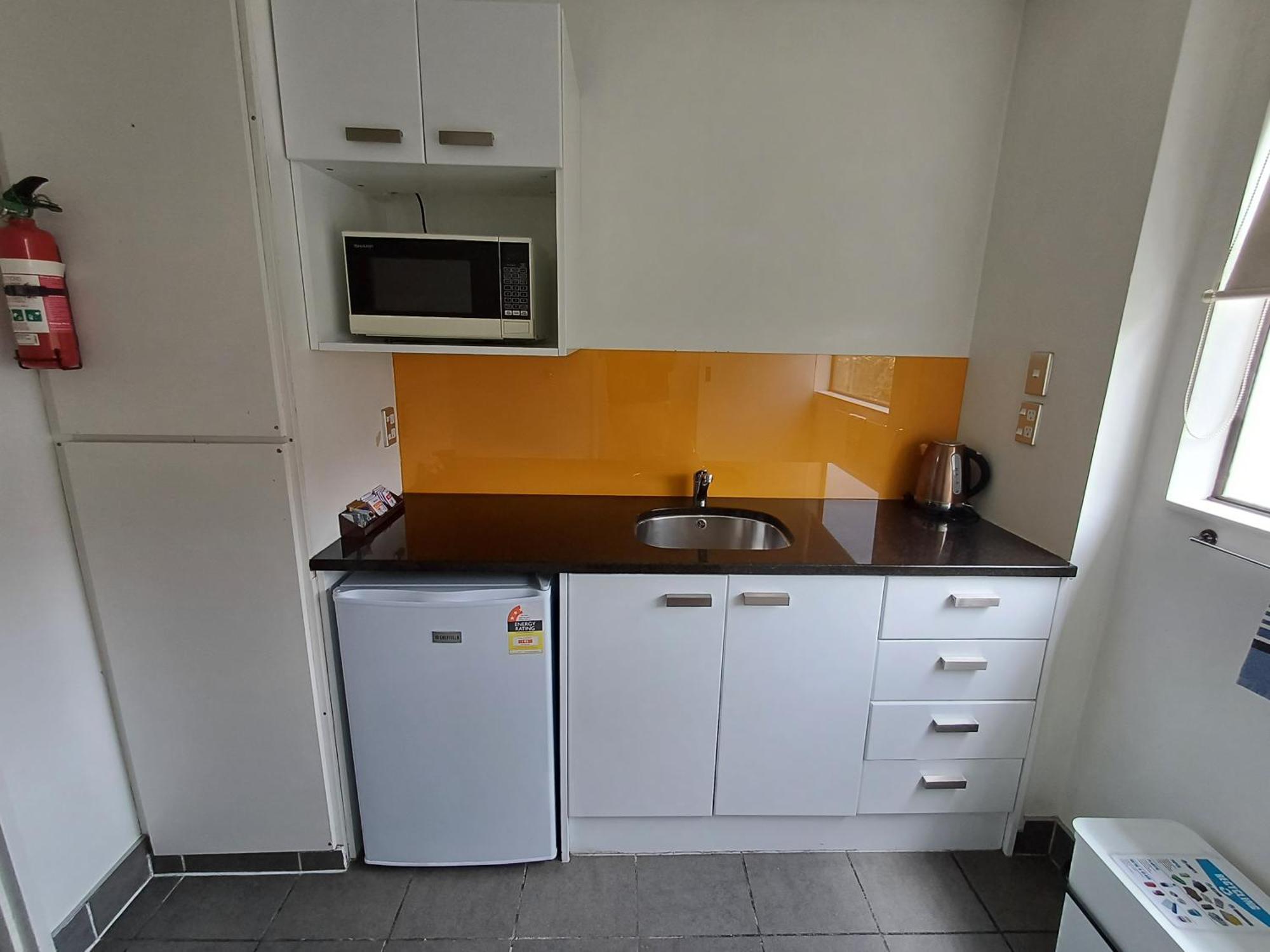 Gothic Heights Motel Christchurch Rom bilde